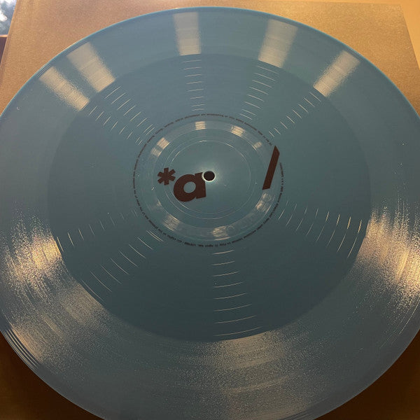 Massive Attack X Tom Waits : Boots On The Ground (12", Single, Bioplastic, Ltd, Blu)