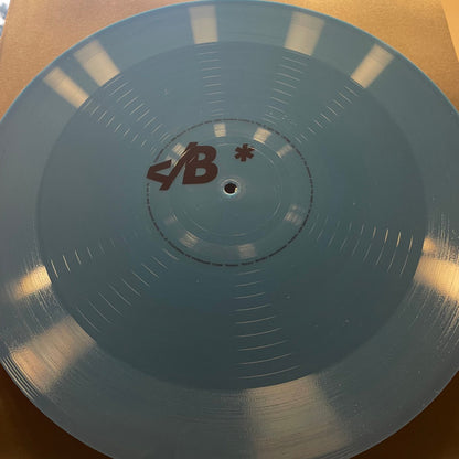Massive Attack X Tom Waits : Boots On The Ground (12", Single, Bioplastic, Ltd, Blu)